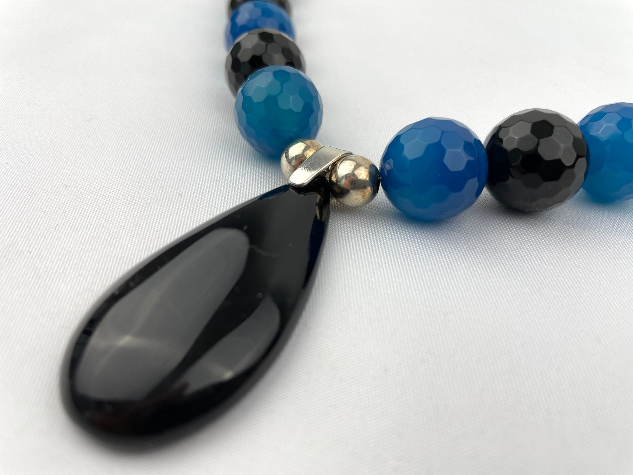 Semi-precious stone necklace with onyx pendant by BlueBird